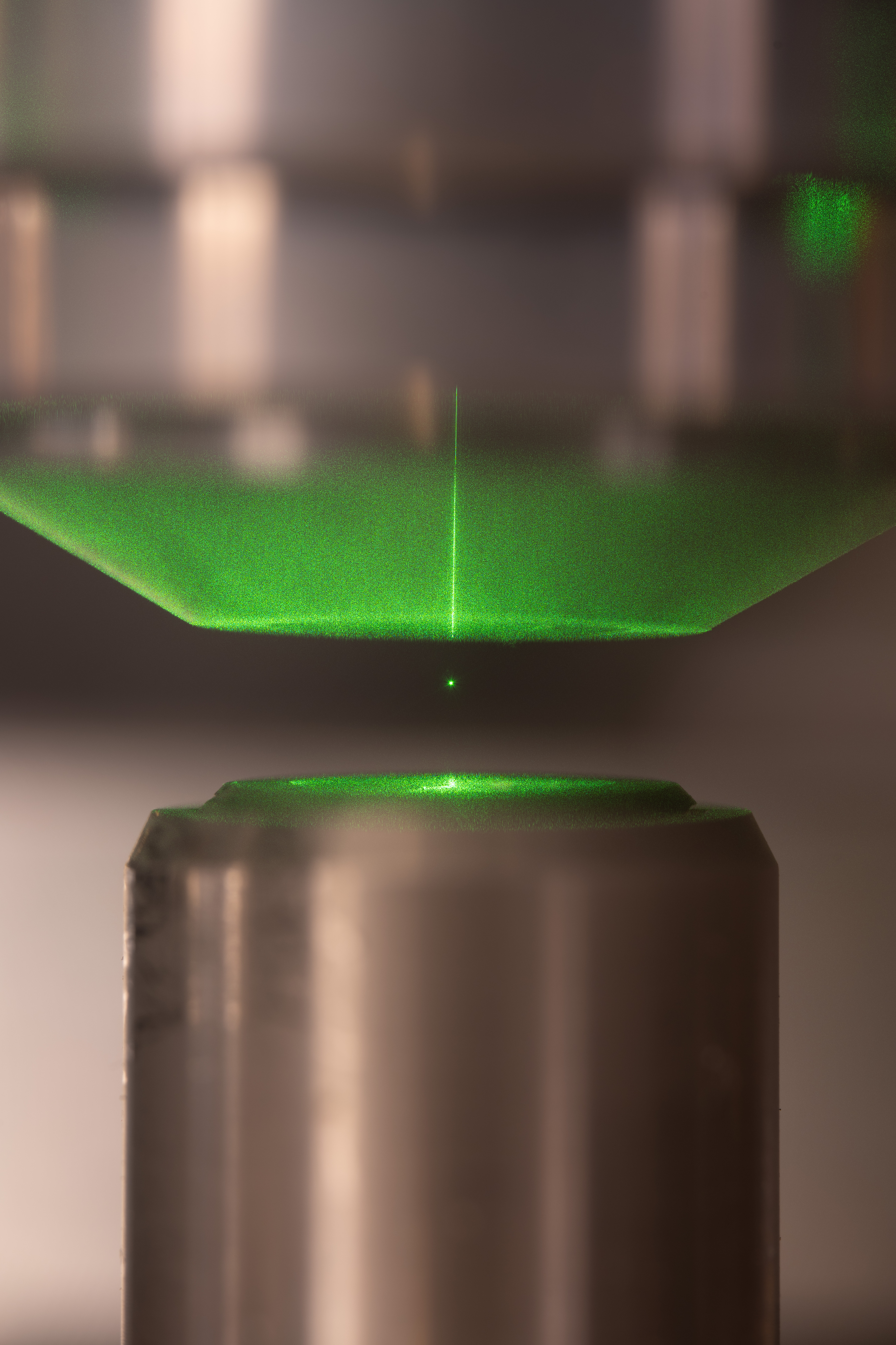 An image of the actual 100nm silica particle held in the optical trap.